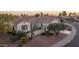 Wide shot of the community featuring desert landscaping, red rock, walkways and private patios at 12953 W Figueroa Dr, Sun City West, AZ 85375