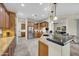 Well-equipped kitchen with stainless steel appliances, granite countertops, and ample cabinet space at 12953 W Figueroa Dr, Sun City West, AZ 85375