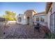 Cozy outdoor patio with brick flooring and seating perfect for enjoying peaceful moments at 12953 W Figueroa Dr, Sun City West, AZ 85375