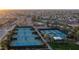 Aerial view of the tennis and pickleball courts within the Corte Bella community at 12953 W Figueroa Dr, Sun City West, AZ 85375