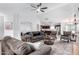 Spacious living room featuring comfortable seating and a ceiling fan at 1357 E Bradstock Way, San Tan Valley, AZ 85140