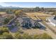 Aerial view of the house and surrounding landscape at 14821 E Chandler Heights Rd, Chandler, AZ 85249