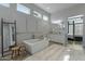 Elegant bathroom featuring a freestanding tub and modern vanity at 14821 E Chandler Heights Rd, Chandler, AZ 85249