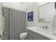 Clean bathroom with shower, toilet, vanity, and white quartz countertop at 14821 E Chandler Heights Rd, Chandler, AZ 85249