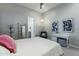 Serene bedroom with a bed, a sitting area, and en-suite bathroom access at 14821 E Chandler Heights Rd, Chandler, AZ 85249