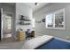 Spacious bedroom with built-in workspace and ample natural light at 14821 E Chandler Heights Rd, Chandler, AZ 85249
