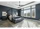 Main bedroom with a large bed and plenty of natural light at 14821 E Chandler Heights Rd, Chandler, AZ 85249