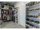 Large walk-in closet with ample shelving and hanging space at 14821 E Chandler Heights Rd, Chandler, AZ 85249