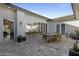 Spacious courtyard with seating and dining areas, offering both indoor and outdoor access at 14821 E Chandler Heights Rd, Chandler, AZ 85249