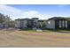 Modern home exterior with walkway and landscaping at 14821 E Chandler Heights Rd, Chandler, AZ 85249