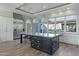 Eat-in kitchen with an expansive island and stainless steel appliances at 14821 E Chandler Heights Rd, Chandler, AZ 85249