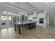 Spacious kitchen with large island and access to the backyard at 14821 E Chandler Heights Rd, Chandler, AZ 85249