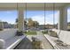 Covered patio with hanging swings and comfortable seating at 14821 E Chandler Heights Rd, Chandler, AZ 85249