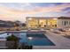 Luxury pool and spa area with lounge chairs at 14821 E Chandler Heights Rd, Chandler, AZ 85249