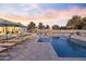 Relaxing pool area with lounge chairs at 14821 E Chandler Heights Rd, Chandler, AZ 85249