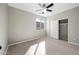Spacious bedroom with light flooring, a large closet, and a window at 14866 W Windsor Ave, Goodyear, AZ 85395