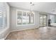 Bright dining area with sliding glass doors to the backyard at 14866 W Windsor Ave, Goodyear, AZ 85395