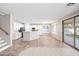 Open concept kitchen with dining area and backyard access at 14866 W Windsor Ave, Goodyear, AZ 85395