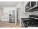 Modern kitchen with stainless steel refrigerator and pantry at 14866 W Windsor Ave, Goodyear, AZ 85395
