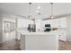 Modern kitchen with an island and stainless steel appliances at 14866 W Windsor Ave, Goodyear, AZ 85395