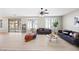 Spacious living room with comfortable seating and a view of the backyard at 14866 W Windsor Ave, Goodyear, AZ 85395