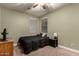 Comfortable bedroom with a double bed and plenty of natural light at 15244 W Alexandria Way, Surprise, AZ 85379