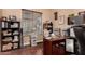 Home office with built-in shelving and desk at 15244 W Alexandria Way, Surprise, AZ 85379