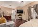 Main bedroom suite with fireplace and built-in shelving at 15244 W Alexandria Way, Surprise, AZ 85379