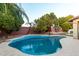 Sparkling kidney-shaped pool, perfect for summer at 15244 W Alexandria Way, Surprise, AZ 85379