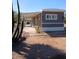 Side view of mobile home showcasing covered walkway at 156 N Hawes Rd # 75, Mesa, AZ 85207