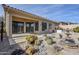 Backyard oasis with fountain, cacti, and desert landscaping at 17421 E Via Del Oro --, Fountain Hills, AZ 85268