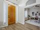 Bright entryway with wood floors and a view of home office at 17421 E Via Del Oro --, Fountain Hills, AZ 85268