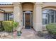 Home's entrance with a wood door and sidelights at 17421 E Via Del Oro --, Fountain Hills, AZ 85268