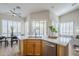 Island kitchen with light wood cabinets, stainless steel appliances, and white quartz countertops at 17421 E Via Del Oro --, Fountain Hills, AZ 85268