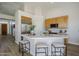 Modern kitchen features a large island with seating, stainless steel appliances, and white quartz countertops at 17421 E Via Del Oro --, Fountain Hills, AZ 85268