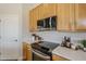 Clean lines and light wood cabinets highlight this kitchen with stainless steel appliances at 17421 E Via Del Oro --, Fountain Hills, AZ 85268