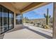 Covered patio overlooking a desert landscape with a large cactus at 17421 E Via Del Oro --, Fountain Hills, AZ 85268