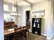 Elegant dining room with wooden table and chandelier at 17531 W Liberty Ln, Goodyear, AZ 85338