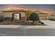 Charming house with stone accents and desert landscaping at 17531 W Liberty Ln, Goodyear, AZ 85338