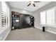Well-equipped home gym with murphy bed and storage at 17531 W Liberty Ln, Goodyear, AZ 85338