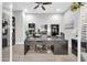 Spacious home office with built-in bookshelves and a large desk at 17531 W Liberty Ln, Goodyear, AZ 85338