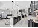 Spacious kitchen boasts an island, stainless steel appliances, and open layout at 17531 W Liberty Ln, Goodyear, AZ 85338