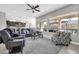 Spacious living room with comfortable seating and large windows at 17531 W Liberty Ln, Goodyear, AZ 85338