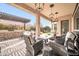 Relaxing patio with seating area and pergola at 17531 W Liberty Ln, Goodyear, AZ 85338