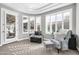 Relaxing sitting area with comfy chairs and ottoman at 17531 W Liberty Ln, Goodyear, AZ 85338