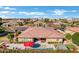 Aerial view of a single Gathering home featuring a backyard pool, patio and well manicured landscaping at 1783 E Desert Broom Pl, Chandler, AZ 85286