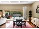 Bright dining area with sliding glass doors and a view of the backyard pool at 1783 E Desert Broom Pl, Chandler, AZ 85286