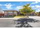 Charming home featuring a lush green lawn, mature landscaping, and a three-car garage at 1783 E Desert Broom Pl, Chandler, AZ 85286