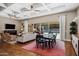 Spacious open living concept with backyard views from the dining area at 1783 E Desert Broom Pl, Chandler, AZ 85286