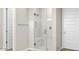 Modern bathroom with walk-in shower and soaking tub at 2320 W Moody Trl, Phoenix, AZ 85041
